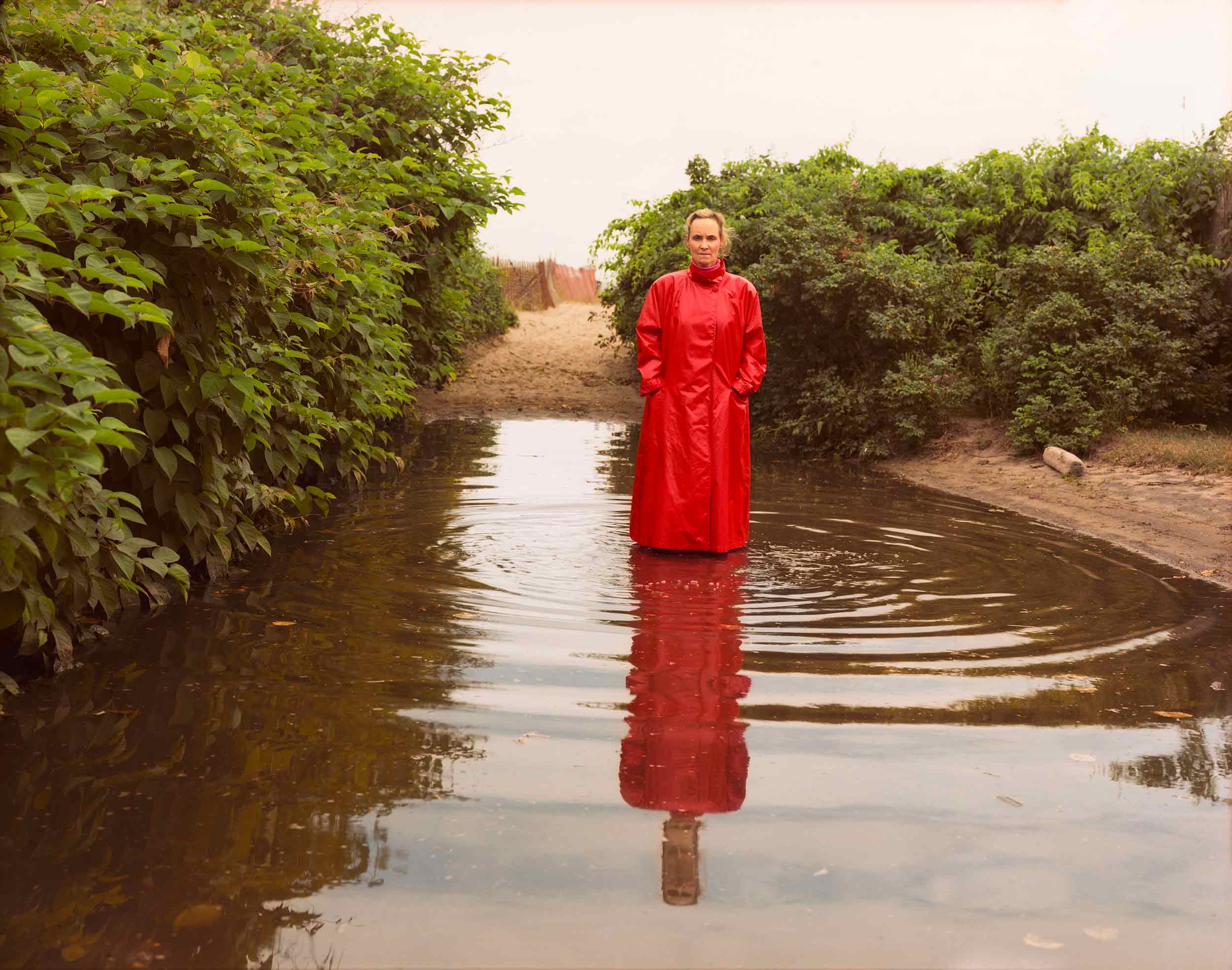 Self Portrait in Red Raincoat,